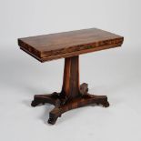 A 19th century rosewood pedestal card table, the hinged rectangular top opening to a red baize lined