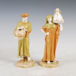 A pair of Royal Worcester figures, dated 1910, modelled as male and female water carriers, green