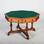 A Victorian oak octagonal shaped centre table, the green baize lined top above four frieze drawers