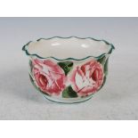 A Wemyss pottery frilled bowl, decorated with roses, impressed and green painted marks, 14cm