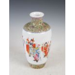 A Chinese porcelain famille rose vase, late 19th/early 20th century, decorated with eight figures