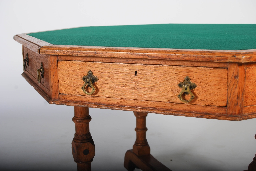 A Victorian oak octagonal shaped centre table, the green baize lined top above four frieze drawers - Image 2 of 3