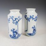 A pair of Japanese blue and white porcelain vases, late 19th century, decorated with vacant