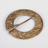 A white metal ring brooch by Alexander Ritchie of Iona, decorated with Celtic scrolls and