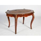 A 19th century burr walnut and gilt metal mounted centre table, the oval top with gilt tooled