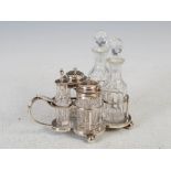 A Victorian silver cruet set, Sheffield, 1875, makers mark of WWH, fitted with two facet cut glass