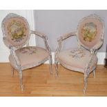 A pair of late 19th/early 20th century needlework upholstered fauteuil, with scroll and foliate