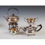 A George V four piece silver tea set, Birmingham, 1928, makers mark of Elkington & Co., circular