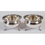 A pair of George V silver bowls, Sheffield, 1910, makers mark of HA, with waived rims, raised on