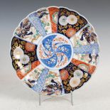 A Japanese Imari charger, late 19th/early 20th century, the central circular panel decorated with