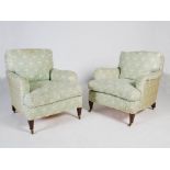 A pair of Lenygon & Morant Ltd. Howard armchairs, the back, arms and loose cushion seats upholstered