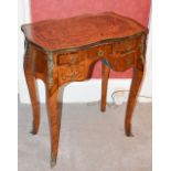 A Louis XV style kingwood and gilt metal mounted side table, the shaped rectangular top above a