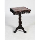 A Chinese table, Qing Dynasty, the shaped square top with a mottled red and white marble insert,