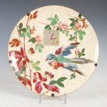 A French pottery charger by Montereau, decorated in the aesthetic taste with flowering branches