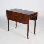 A 19th century mahogany Pembroke table, the rectangular top with twin drop leaves above a single end