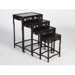 A quartetto of Chinese dark wood occasional tables, late 19th/early 20th century, the panelled