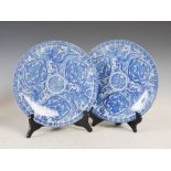 A pair of blue and white Japanese chargers, early 20th century, printed with central circular
