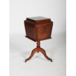 A 19th century mahogany cellarette, the hinged square cover opening to a fitted interior, the