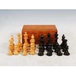 An early 20th century chess set, weighted pieces, in mahogany box.