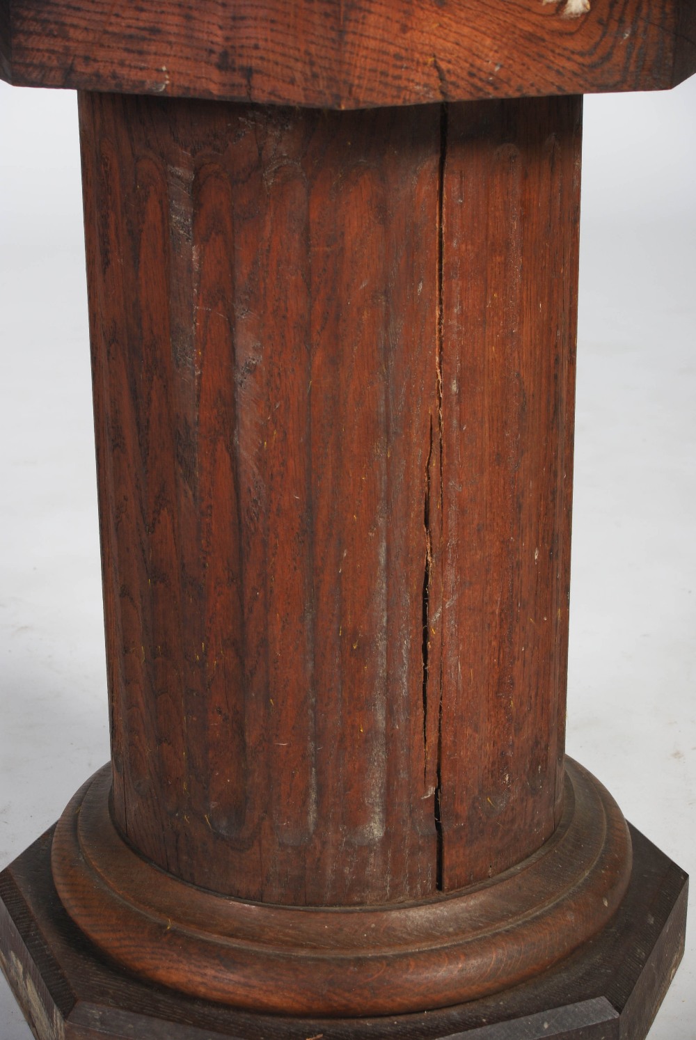 A 20th century oak octagonal plinth in the form of a fluted column, 36cm diameter x 58.5cm high. - Image 4 of 5