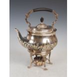 A Victorian silver tea kettle on stand, London, 1899, makers mark of William Hutton & Sons, oval