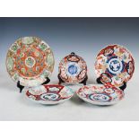 Three assorted Imari plates, 21.5cm diameter, together with a smaller Imari dish, 16cm diameter