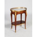 A 20th century French mahogany, marquetry and ormolu mounted occasional table, the oval shaped white