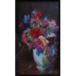 Kate Wylie (1877-1941) Still life of mixed flowers in a white vase oil on canvas, signed lower