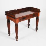 A 19th century Anglo Indian padouk side table, the rectangular top with shaped three quarter gallery