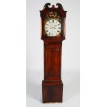 A 19th century mahogany longcase clock, W.M. Thomson, Dalkeith, the enamelled dial with Roman