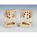 A pair of Chinese soapstone book ends, late 19th/early 20th century, carved with figure and ox, 18cm