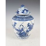 A 19th century Japanese blue and white Arita porcelain jar and associated cover, the jar decorated