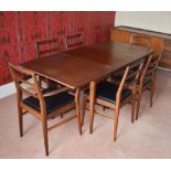 A mid 20th century teak dining room suite by Heal's, London, comprising rectangular sideboard fitted