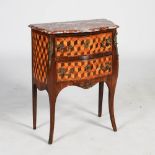 A late 19th/early 20th century French kingwood, parquetry and gilt metal mounted commode, the