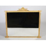 A 19th century gilt wood overmantel mirror, with shell carved crest, the rectangular mirror plate