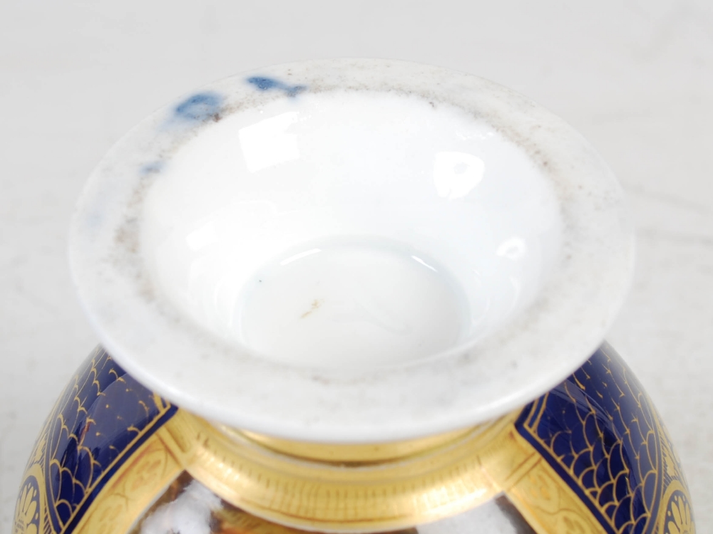 A late 19th/early 20th century Paris porcelain cobalt blue ground chocolate cup, decorated with a - Image 5 of 9