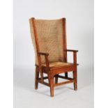 A late 19th/early 20th century pine Orkney chair, with woven drop in upholstered seat, 106cm high.