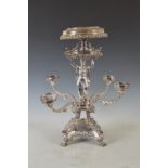 An impressive 19th century electroplated table centrepiece, cast with a classical female holding