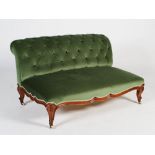 A neatly proportioned Victorian walnut sofa, the green velvet upholstered button down back and stuff