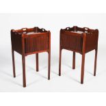 A pair of George III style mahogany bedside cabinets, the rectangular tops with raised gallery and