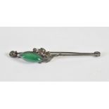 An Arts & Crafts white metal and chrysoprase brooch, 8.6cm long.