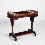 A William IV rosewood writing table, the shaped top with a velvet lined hinged slope flanked by