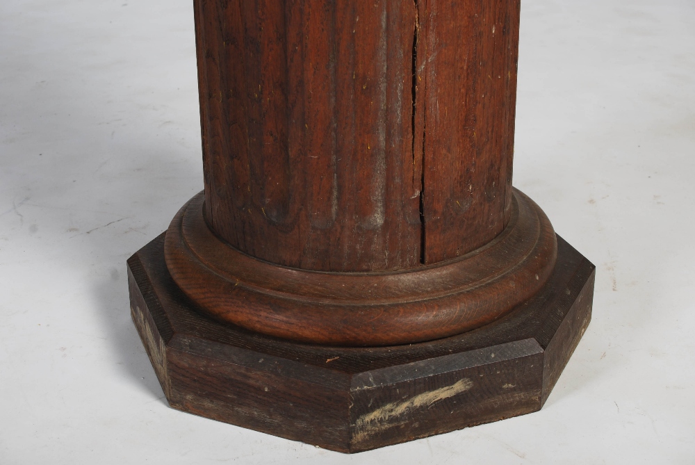 A 20th century oak octagonal plinth in the form of a fluted column, 36cm diameter x 58.5cm high. - Image 5 of 5