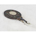 A Chinese jade, white metal, enamel and semi precious stone set hand mirror, the circular mirror