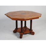 A 19th century pollard oak and ebony lined octagonal shaped centre table, the shaped top centred