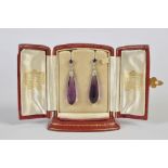 A pair of early 20th century amethyst and diamond earrings by Cartier, each set with a round faceted