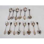 A part suite of George III silver flatware, London, 1790, makers mark of W.E., fiddle pattern with