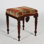 A William IV mahogany stool, the upholstered seat above a frieze carved with inverted anthemion