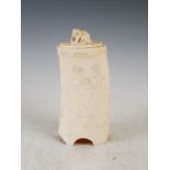 A Japanese ivory tusk vase and cover, Meiji Period, decorated in shallow relief with three