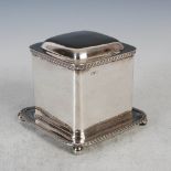 A Victorian silver box and cover, London, 1897, makers mark of William Hutton & Sons, square